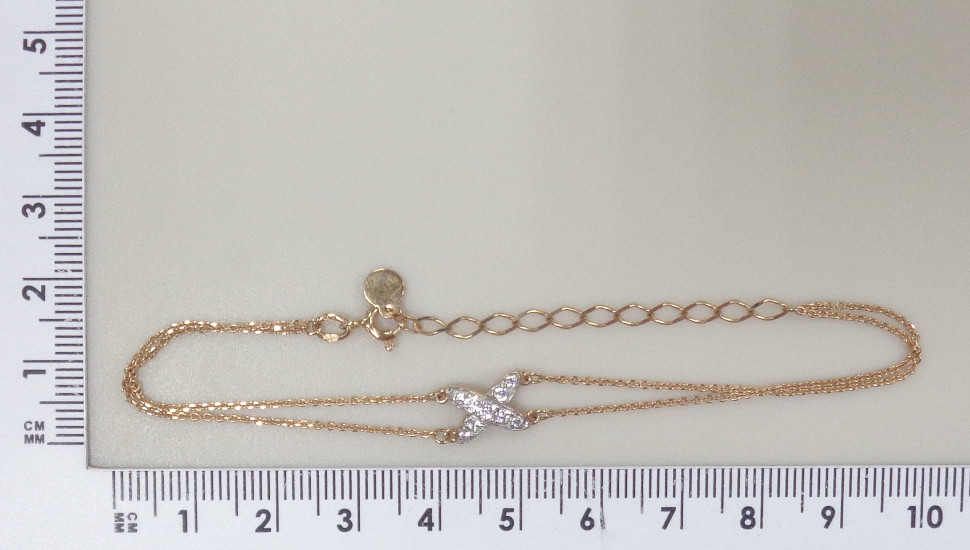 Золотой браслет 585 пробы; родий; плетение Якорное; вставки 9 Фианит бесцв.;